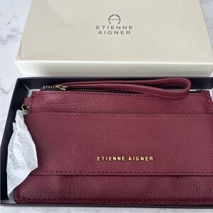 Etienne Aigner Wine Red Pebbled Leather Wristlet with Gold Logo